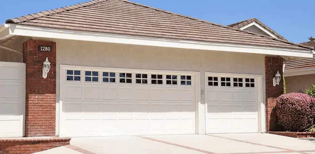 Residential garage door repair service for a double garage door in Hialeah, FL