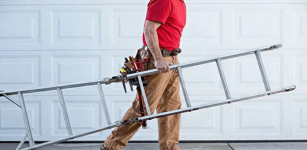 Garage door repair technician arriving with tools and ladder in Hialeah, FL