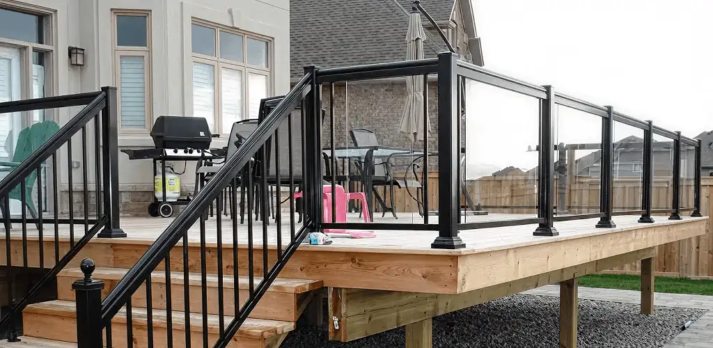 Handrail installation on a deck staircase for safety and code compliance in Hialeah, FL